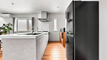 Apartment | Private kitchen | Fridge, microwave, stovetop, dishwasher