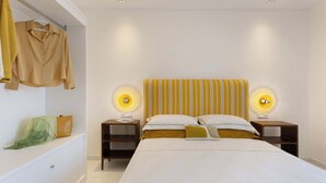 Ein modernes Schlafzimmer mit einem großen Bett, zwei Nachttischen mit Lampen, einem Kleiderschrank und einem Kleiderhaken.