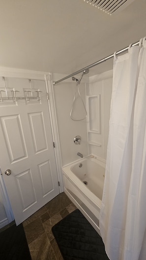 Jetted bath, hair dryer, bidet, towels