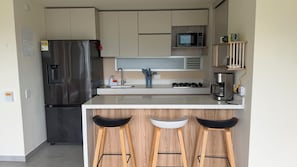 Private kitchen - 2-bedroom apartment in charming San Jerónimo with AC and private jacuzzi. (San Jerónimo)