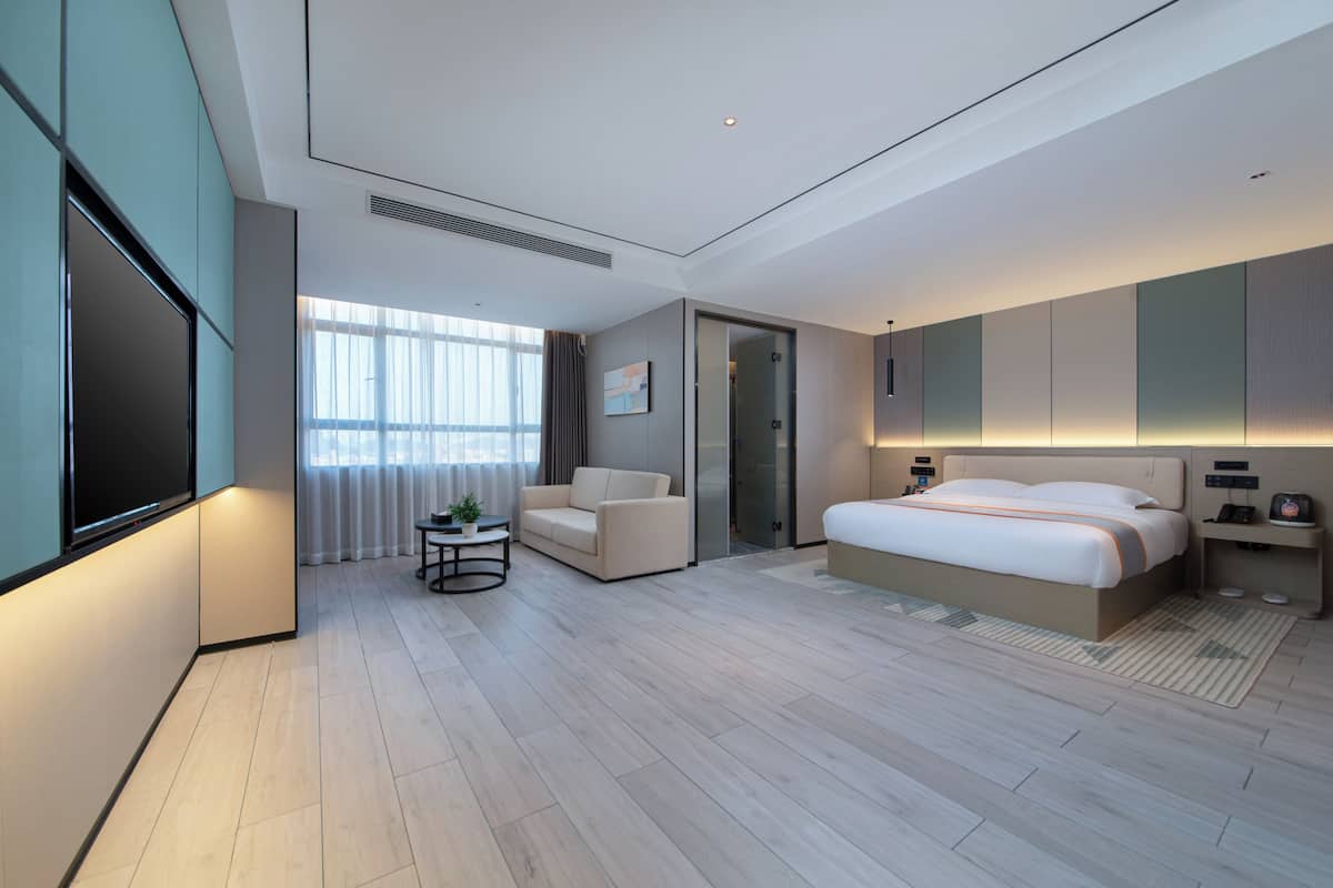 Habitación individual de lujo, vista a la ciudad | Escritorio, espacio para trabajar con laptop y wifi gratis 