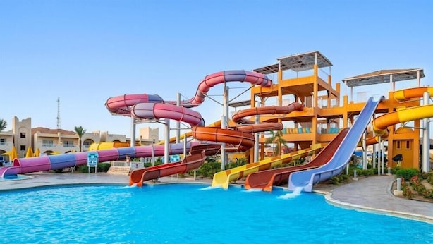A water park with multiple slides and a pool. - Pickalbatros Vita Resort Portofino (Marsa Alam)