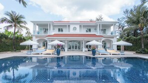A large two-story house with a swimming pool in front. - Villa Carpe Diem by Elite Havens (Natai)