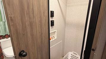 Shower, towels, soap, toilet paper