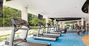 A gym with treadmills and exercise equipment. - Deluxe Studio at Tambuli Resort (Lapu-Lapu)