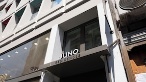 A building with a sign that reads 'JUNO RESIDENCES.' - Juno Residences (Istanbul)