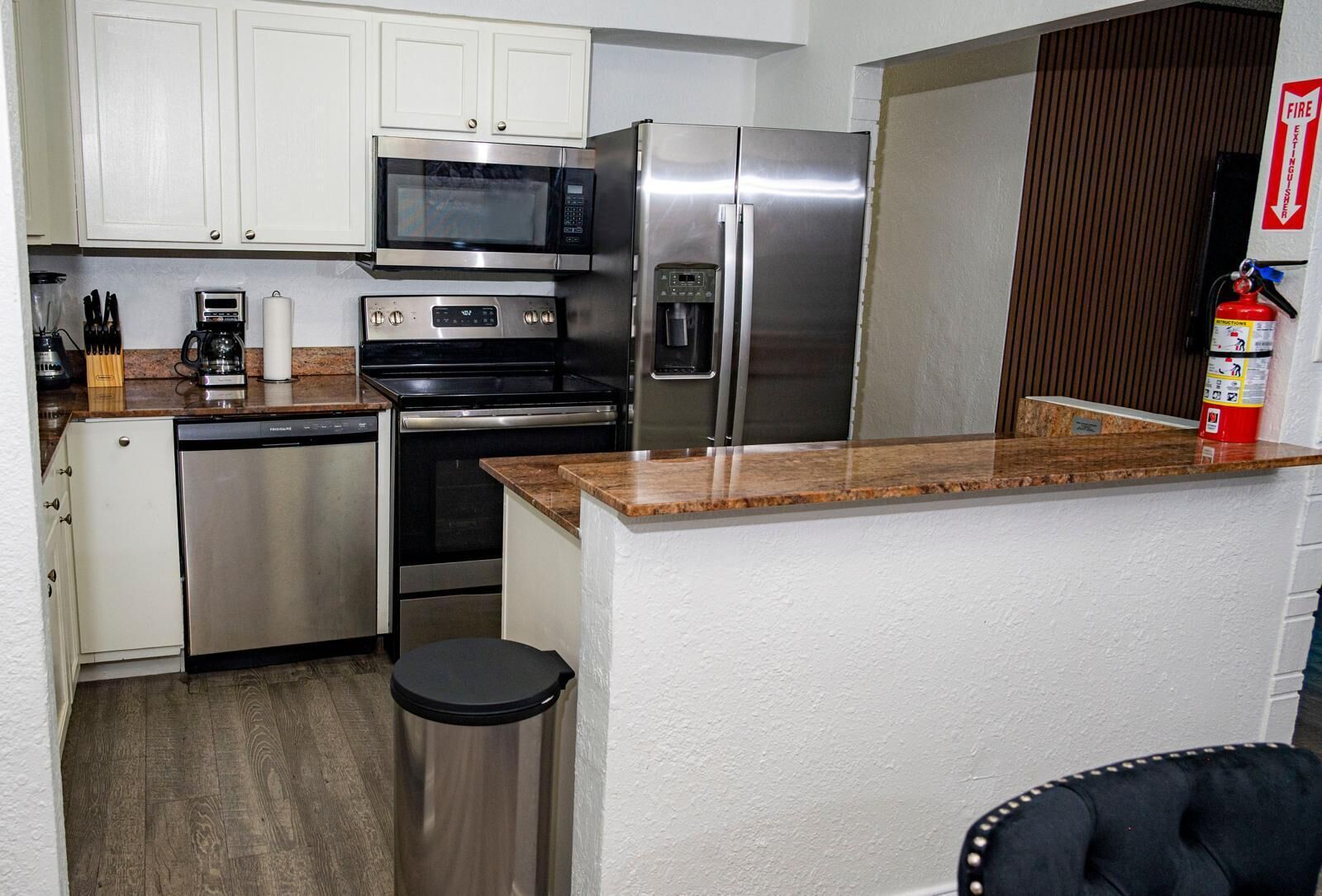 Coffee/tea maker, fridge, microwave, oven