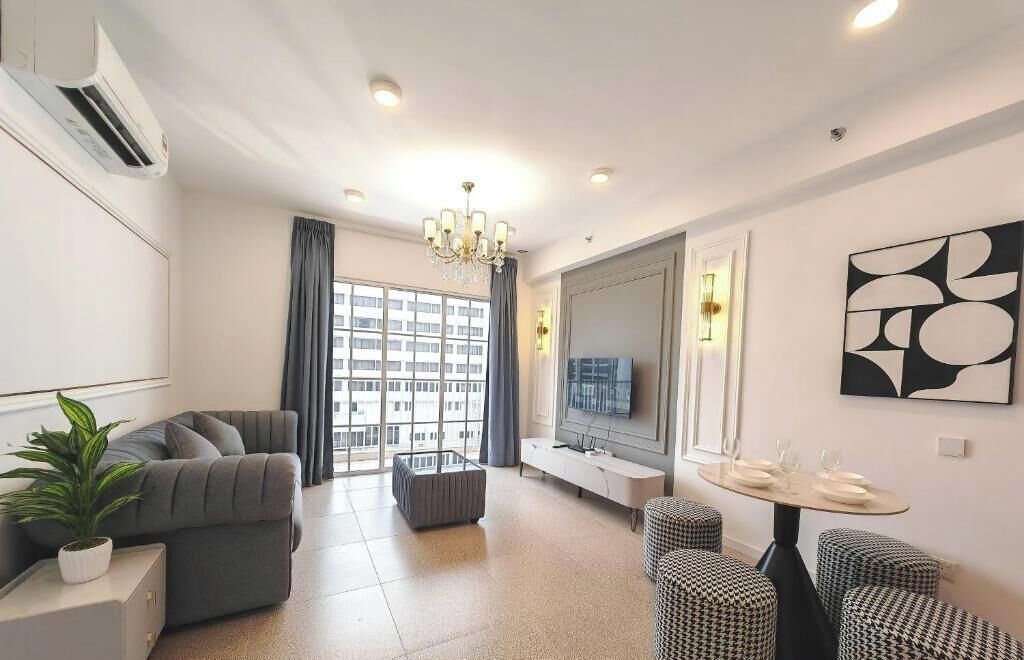 Appartement Deluxe, balcon, vue jardin | Coin séjour