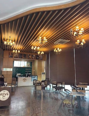 Deluxe Studio, Balcony, City View | Dining - The Spira Skyline Stay (Noida)