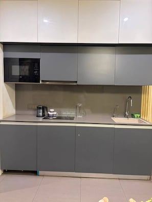 Deluxe Studio, Balcony, City View | Private kitchen - The Spira Skyline Stay (Noida)