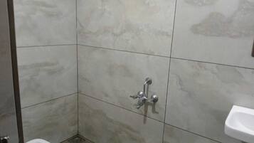 Standard Double Room | Bathroom | Shower, towels, soap, shampoo