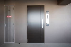 Two doors, one with a fire alarm sign and the other with a number plate. - 1 min walk from sta./Excellent access to central (Osaka)