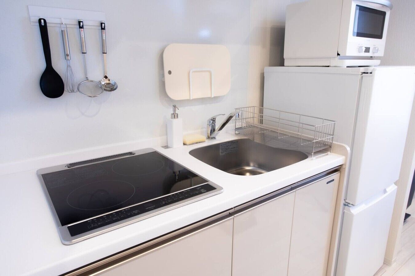 Fridge, microwave, stovetop, cookware/dishes/utensils
