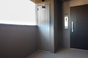 A modern elevator with a metallic finish and a door with a handle. - 1 min walk from sta./Excellent access to central (Osaka)