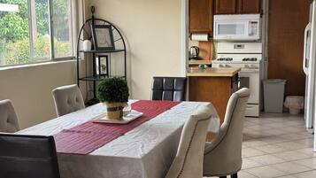 Coffee/tea maker, fridge, microwave, oven