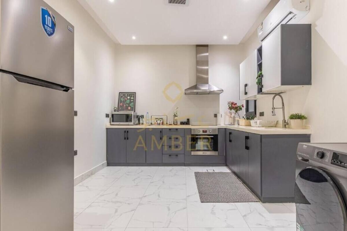 Appartement | Privékeuken | Een koelkast, een microgolfoven, een oven, een kookplaat