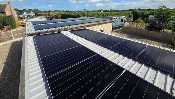 A solar panel installation on a building's roof.