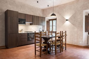 Apartamento, vista para o jardim | Opções para refeição