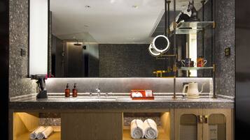 Separate tub and shower, rainfall showerhead, hair dryer, bathrobes