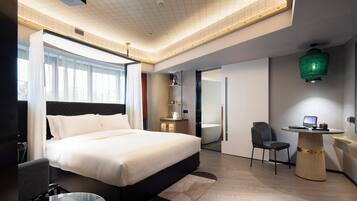 Premium bedding, down duvets, pillow-top beds, free minibar