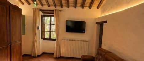 Luxury Apartment, Patio, Garden View | Living area