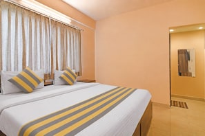 Family Room, Partial Lake View | Desk, laptop workspace, blackout drapes, iron/ironing board - The Bliss (Kolkata)