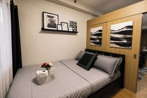 Apartment, 1 Bedroom | Desk, WiFi (free), bed sheets - Trees Residences Condominium By Smdc (Caloocan)
