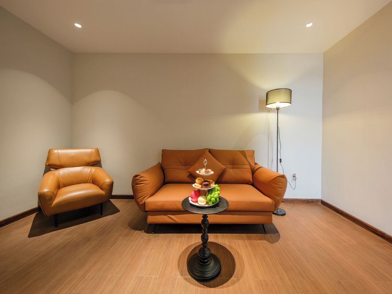 Quarto casal júnior, vista para a cidade | Área de estar