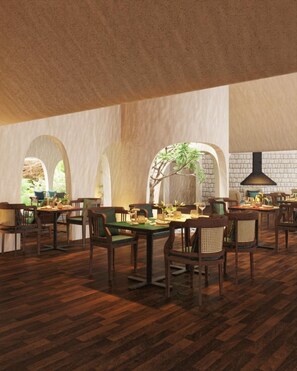 A spacious indoor dining area with multiple tables and chairs, arched windows, and a brick wall. - The Myst Sapa Resort (Sa Pa)