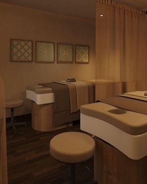 A modern spa room with a massage table, a small stool, and a wooden floor. - The Myst Sapa Resort (Sa Pa)