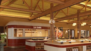 A buffet area with multiple serving stations, a clock, and a La Gare sign.