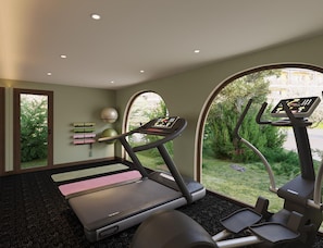 A gym with treadmills, a stationary bike, and a yoga mat area. - The Myst Sapa Resort (Sa Pa)