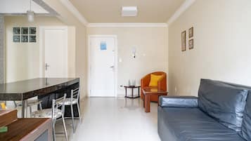 Basic Apartment | Living area | 40-inch TV with digital channels