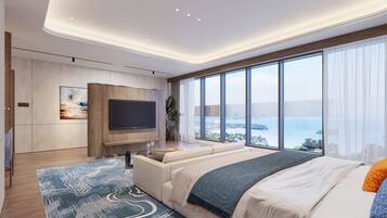 Un dormitorio moderno con una cama grande, un televisor de pantalla plana y vistas a un cuerpo de agua.