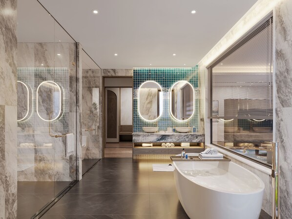 A modern bathroom with a freestanding bathtub, a vanity with a large mirror, and a glass-enclosed shower area.