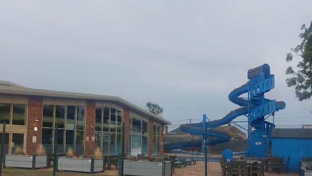 A building with a modern architectural style, featuring large windows and a brick facade. - Highfield Grange Family Holiday Park (Clacton-on-Sea)