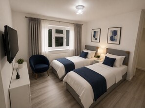 3 slaapkamers, een strijkplank/strijkijzer, gratis wifi, beddengoed