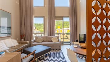 Basic Apartment | Living area | 40-inch TV with digital channels