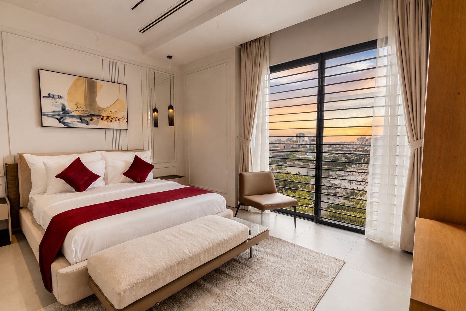 A modern bedroom with a large bed, a chair, and a city view.