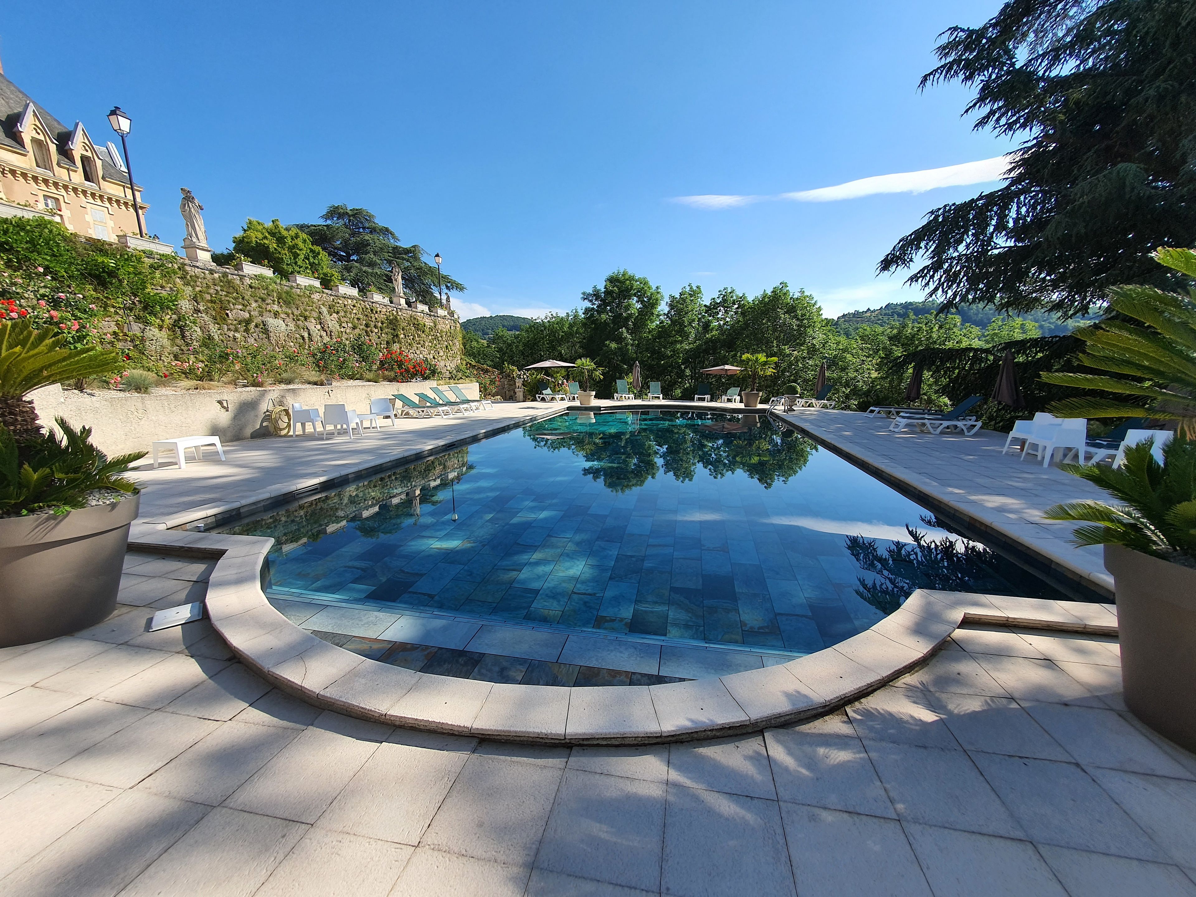 Seasonal outdoor pool, pool loungers