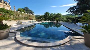 Seasonal outdoor pool, pool loungers
