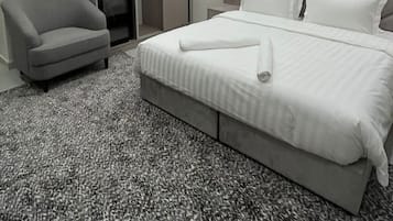 Chambre Économique | Coffres-forts dans les chambres, fer et planche à repasser