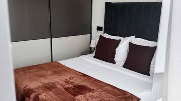 Classic Apartment, Balcony, City View | Desk, laptop workspace, iron/ironing board, free WiFi