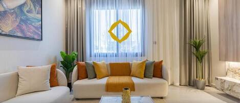 Departamento Deluxe | Área de sala de estar