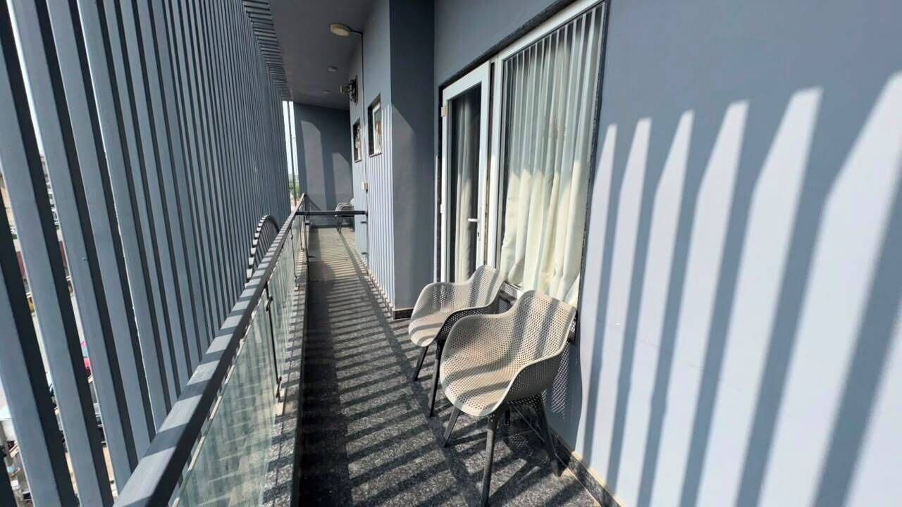 Suite, balcón | Jardines del alojamiento