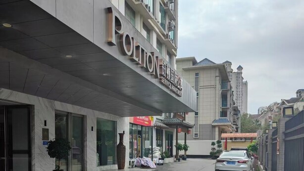 A building with a sign that reads 'POLION SERVICE APARTMENT'. - Poltton International Service Apartment (Liuzhou Yaobu Ancient Town Chengzhong Wanda Plaza) (Liuzhou)