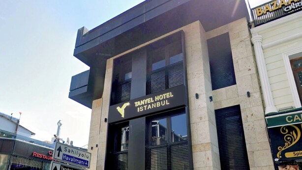 A hotel building with a sign for TANYEL HOTEL ISTANBUL. - Tanyel Hotel (Istanbul)