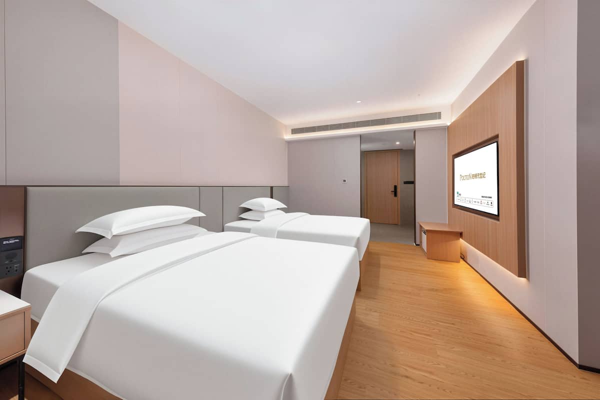 Habitació amb dos llits individuals Comfort | Escriptori i wifi gratuïta 
