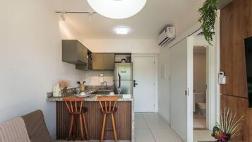 Basic Apartment | Living area | 40-inch TV with digital channels