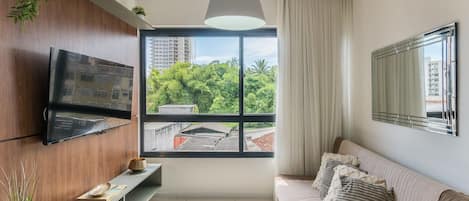 Basic Apartment | Living area | 40-inch TV with digital channels
